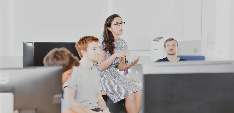 Researchers in classroom at Oxford's Deparment of Engineering Science