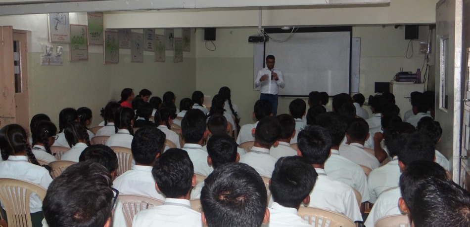 Lecture to a group of students in India